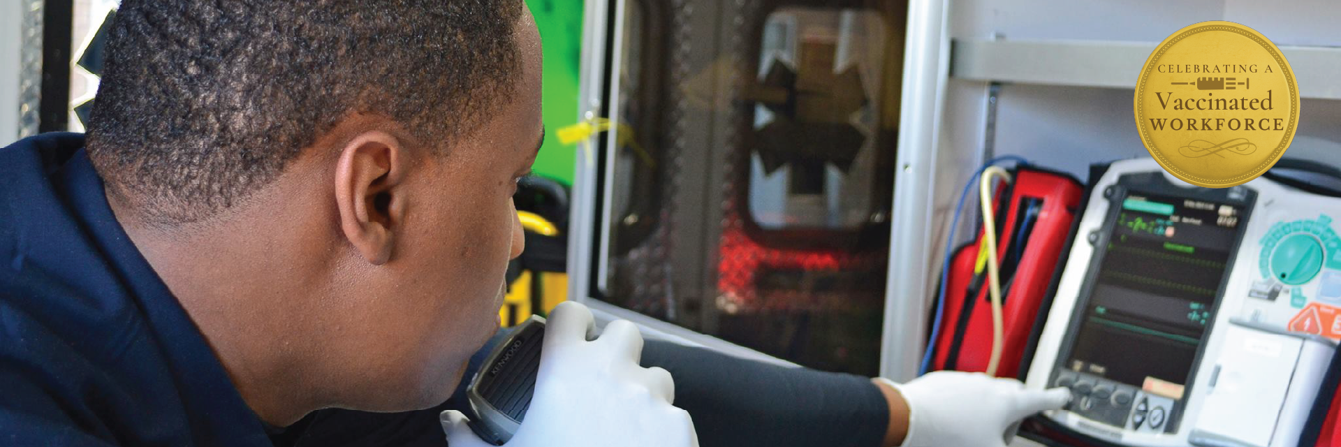 Male EMT calling in from radio inside ambulance